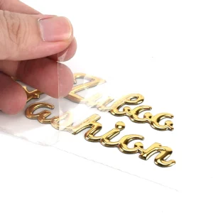 High Glossy Gold 3D Soft Labels Metallic Ink PVC Stickers For Fashion Apparel Luxury Decal